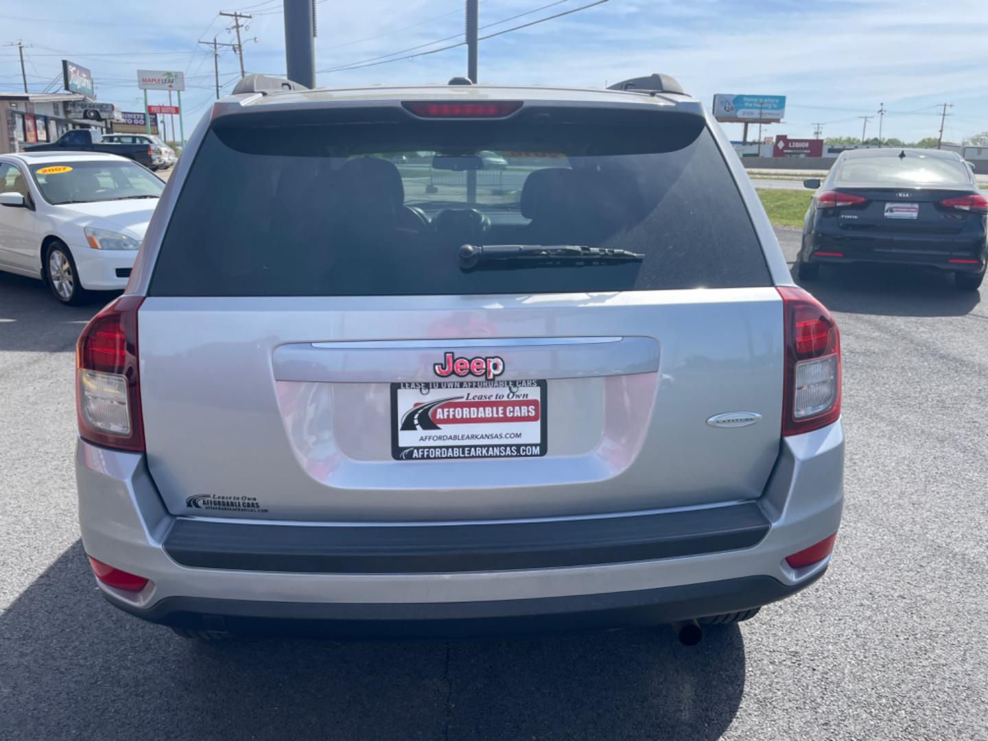 2016 Silver Jeep Compass (1C4NJCEA4GD) with an 4-Cyl, 2.0 Liter engine, Automatic, CVT transmission, located at 8008 Warden Rd, Sherwood, AR, 72120, (501) 801-6100, 34.830078, -92.186684 - Photo#6